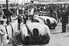 273. Type 57G Cars 1 & 2 stand beside pit wall. Le Mans 1937.