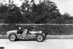 86A. Type 59 ACF 23 June 1935 (Montlhery). Car 24, Robert Benoist. After an unsuccessful attempt to secure the bonnet. (retired later in race).