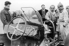 98. Type 101 Prototype 101 (probably converted T57C) on test in running chassis form. Pierre Marco holding radiator cap, Maurice Trintignant in overalls, and Louis Rosier.