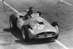 144A. Type 251 Type 251 Roland Bugatti takes car to the pits. French Grand Prix 1 July 1956 Reims