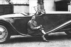 246. Jean Bugatti sitting on running board of Esders Type 41 Royale