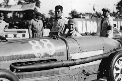 121A Louis Chiron in Type 54 at Monza 1932 with Wurmser beside car