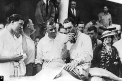 472 Jean-Pierre Wimille with Robert Aumaitre and Lucien Wurmser in the background, Reims 1935-6?